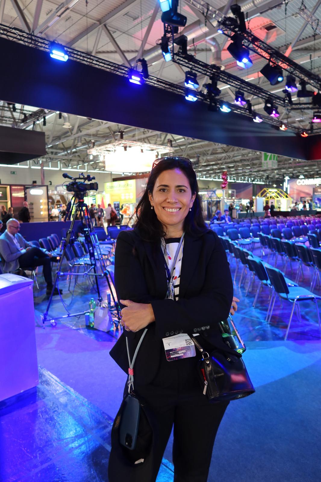 Margarita Colombo at DMEXCO 2026, standing in front of an event stage.